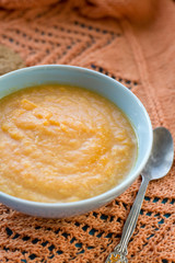 Dietary pumpkin porridge in the blue plate