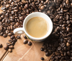 cup of coffee on the wooden table
