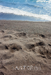 Text Santorini made with pumice stones