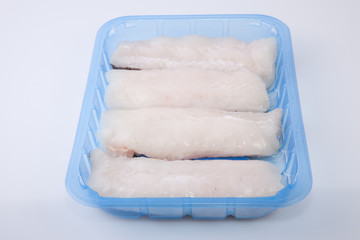 Hake steaks on tray