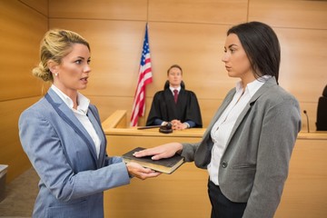 Witness taking an oath