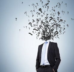 businessman with question marks
