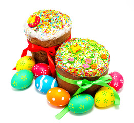 Two decorated easter cakes and eggs isolated