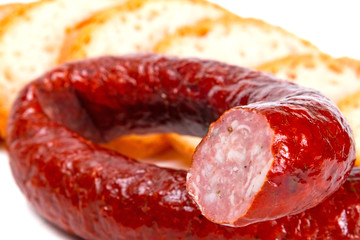 Traditional Polish smoked sausage and sliced bread