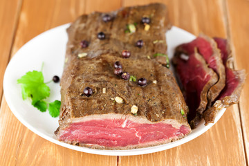 Delicious dinner of rare roast beef