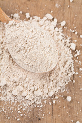 chestnut flour in a wooden spoon