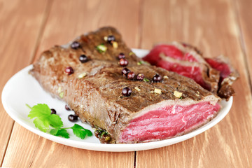 Delicious dinner of rare roast beef