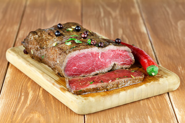 Delicious dinner of rare roast beef