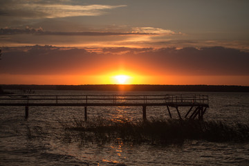 Wooden pier at sunset