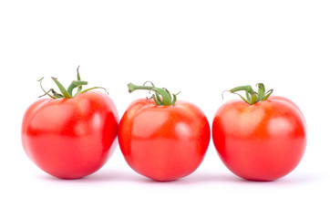 Fresh tomatoes on white background