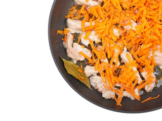 Roast meat with carrots in the pan, background