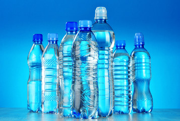 Composition with assorted plastic bottles of mineral water