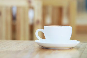Coffee cup in coffee shop - vintage style effect picture
