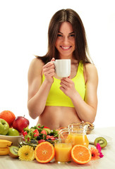 Young woman having breakfast. Balanced diet