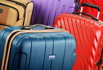 Composition with colorful travel suitcases