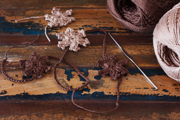 Brown crochet snowflakes for Christmas decoration