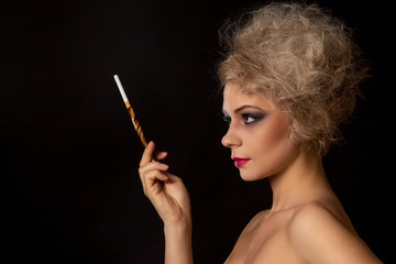 Obraz premium wonderment girl in profile with lush hair and evening make-up