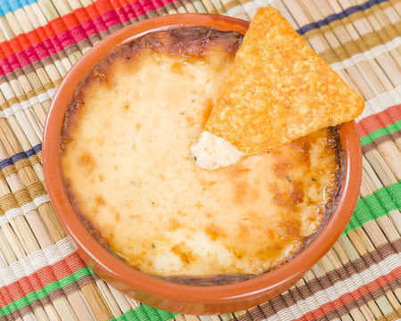 Baked Cheese - Melted cheese dip served with tortilla chips.