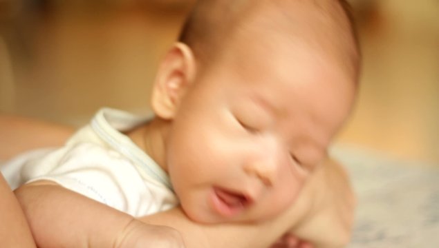 Baby being burped