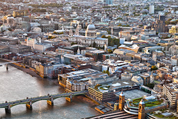 Aerial view over City of London at sunset
