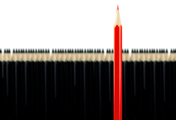 Red pencil among black pencils