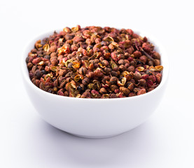 sichuan or japanese pepper in white bowl