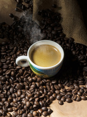 cup of coffee on the wooden table