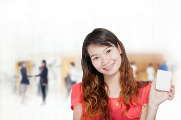 Portrait of young asia business woman in her office.