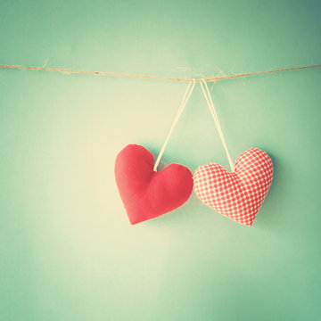 Vintage cotton hearts hanging on a line