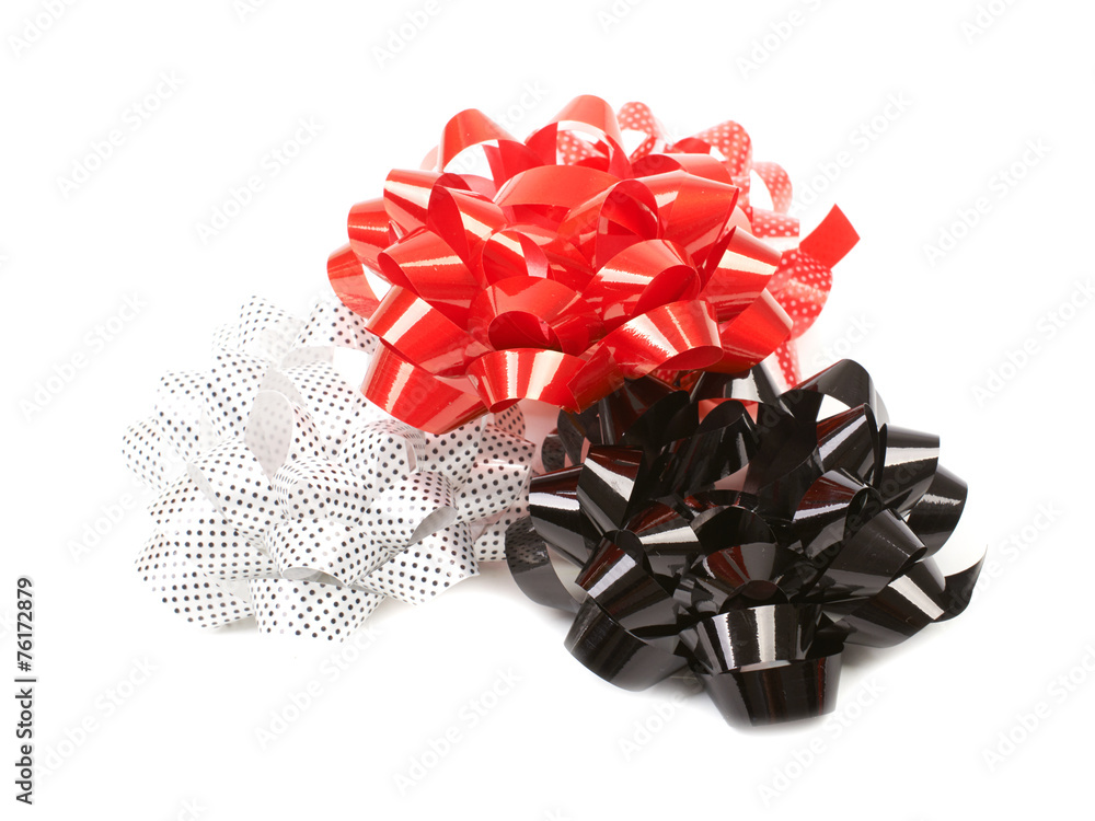 Wall mural set of three gift bows: white polka dots, red and black on a whi