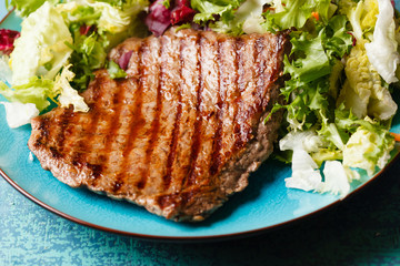steak with salad