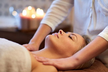 Fototapeta na wymiar close up of woman lying and having massage in spa