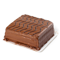 A chocolate fudge layer cake on white. Selective focus.
