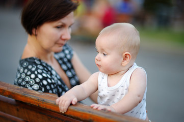 Fototapeta premium Beautiful middle aged woman and her adorable little grandson
