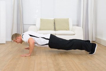 Muscular Man Doing Pushups