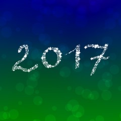 Fototapeta premium White snowflakes 2017 inscription on bokeh background