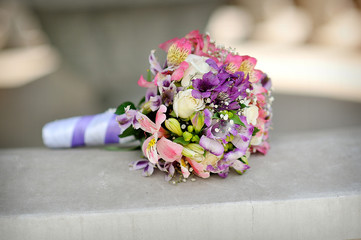 bridal bouquet of purple flowers