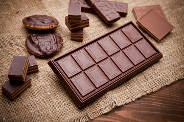 Chocolate pieces on wooden table