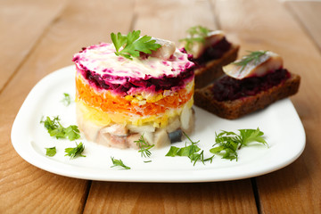 Russian herring salad  and sandwiches