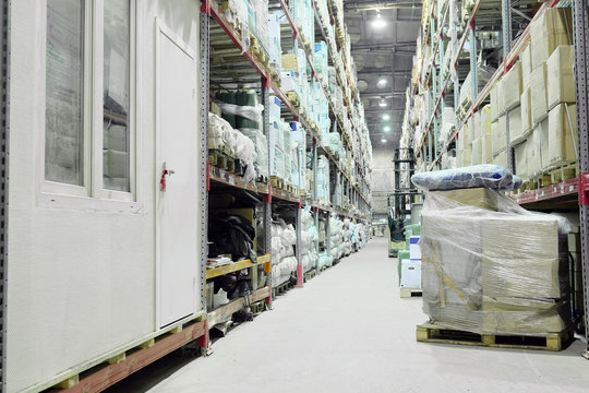 The image of shelves in the warehouse