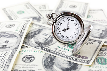 Silver pocket clock and money close-up. Time is money concept
