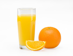 A glass of orange juice on a white background and orange slices