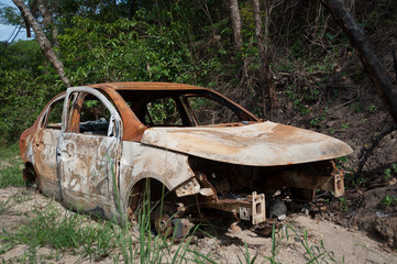 Abandoned Car in the Woods