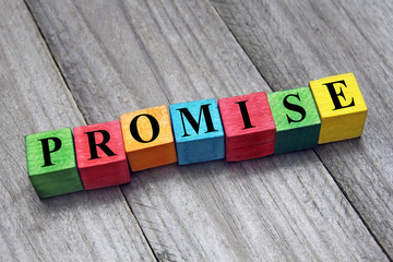 word promise on colorful wooden cubes