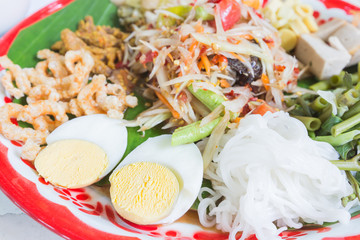 Green papaya salad in tray