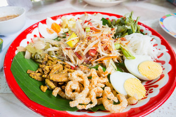Green papaya salad in tray