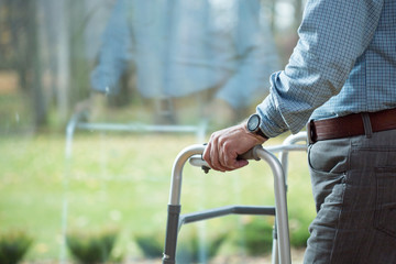 Obraz premium Leaning on walker