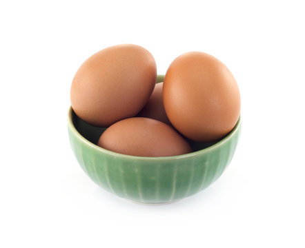 egg in green cup, isolated on white