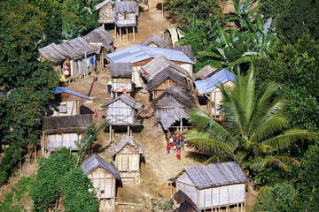 Typical malgasy village - african hut, poverty in madagascar