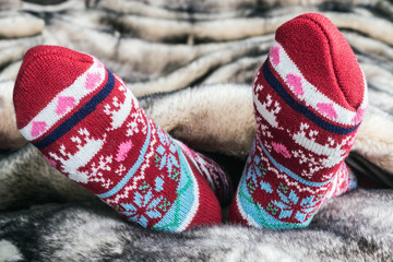 Female legs in Christmas socks